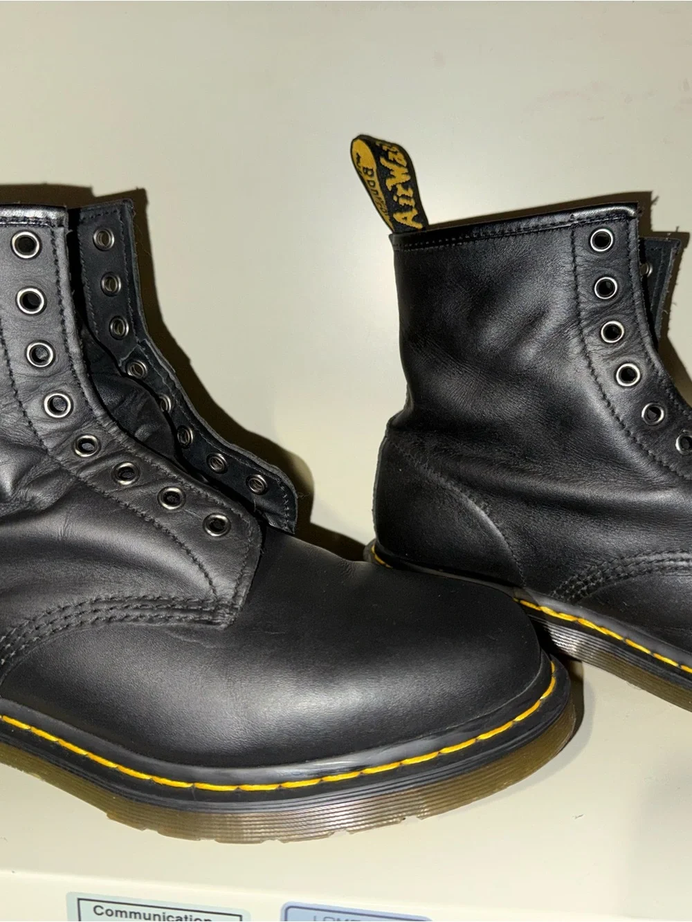 Dr. Martens Black Leather 8-Eye Boots with Yellow Stitching